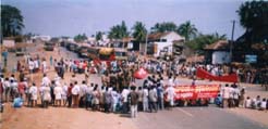 Party activists blocking national highway in Kakinada